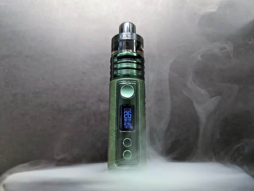 VOOPOO Drag H40 Surrounded by a vape cloud